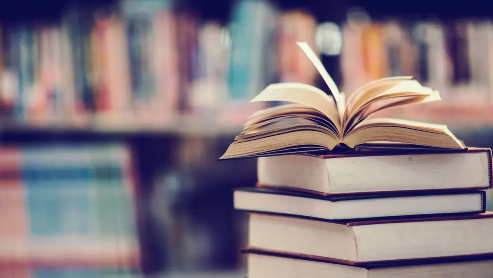 bookinlibrarywithopentextbookeducationlearningconcept
