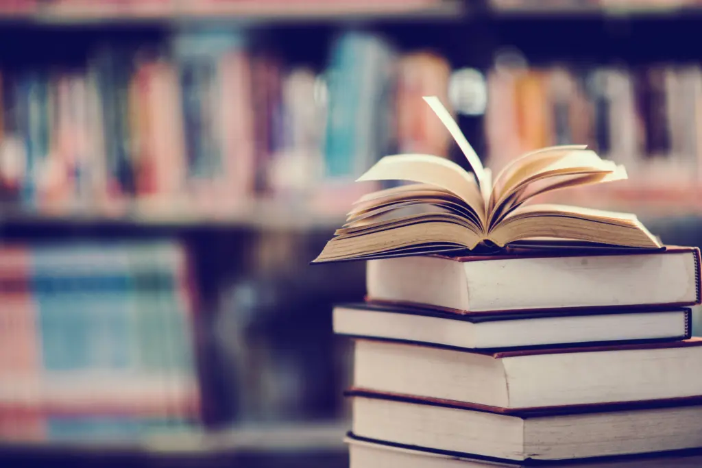 bookinlibrarywithopentextbookeducationlearningconcept