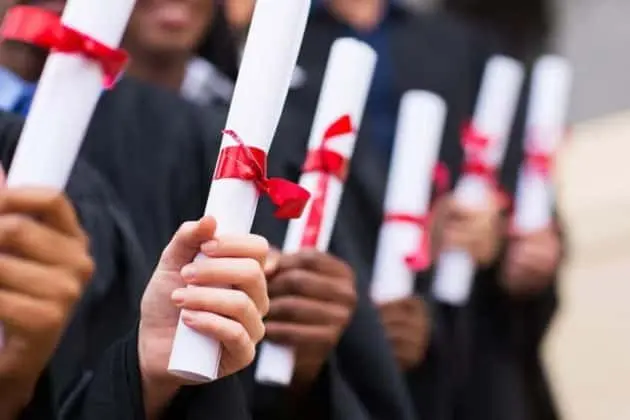 group-of-graduates-holding-diploma