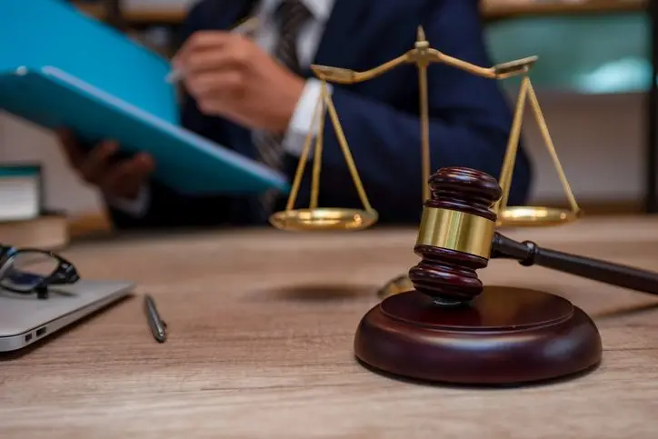 male-lawyer-working-with-contract-papers-and-wooden-gavel-on-tabel-in-courtroom-justice-and-law-attorney-court-judge-concept-2