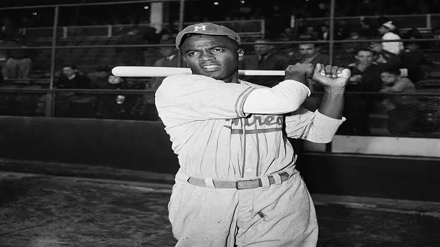 jackie-robinson-swinging-bat