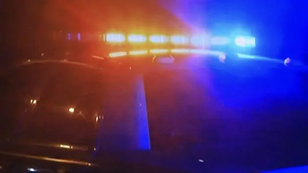 police-car-fast-moving-with-bright-flashing-lights-20