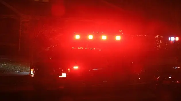 paramedic-vehicle-with-flashing-lights-at-night