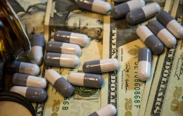 pills-with-cash-e1551192493543