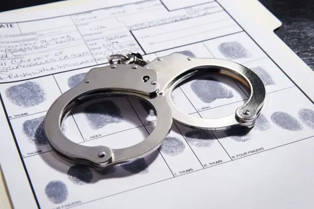 handcuffs-with-fingerprints-e1555593494118
