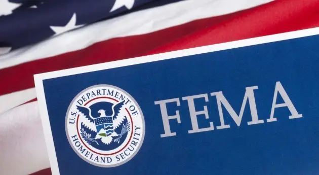 fema-with-flag-e1575466617439