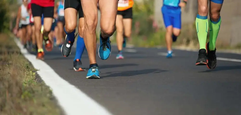 marathon-running-race-people-feet-on-city-road