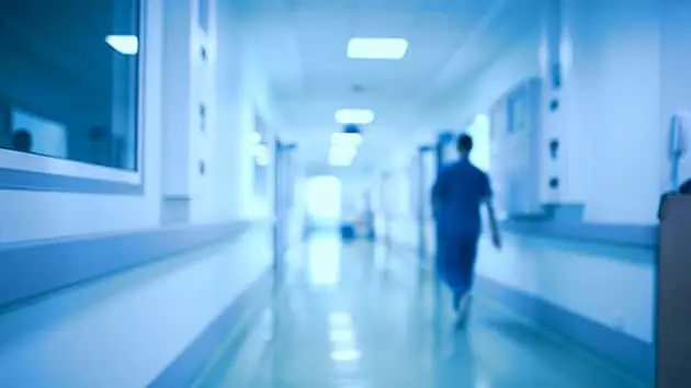 hospital-corridor-and-doctor-as-a-blurred-defocused-background