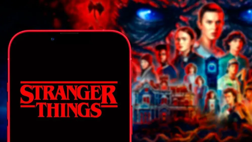 phone 11 pro with the Stranger Things logo. Stranger Things is an American web series of suspense and science.