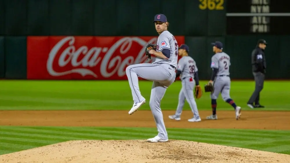 Cleveland Guardians pitcher Shane Bieber pitches against the Oakland Athletics on Opening Day at the Oakland Coliseum. Oakland^ California - March 28^ 2024