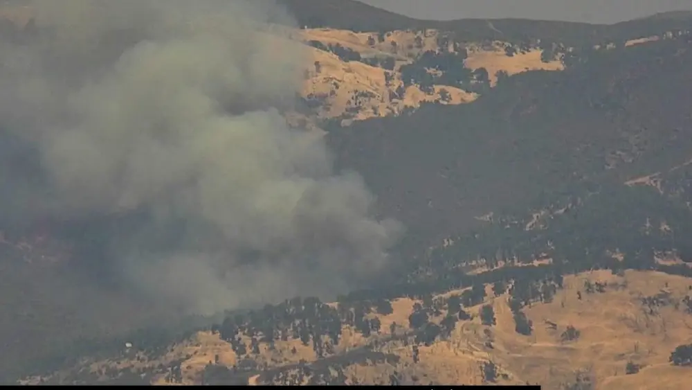 smoke-billowing-up-from-sky-fire783992