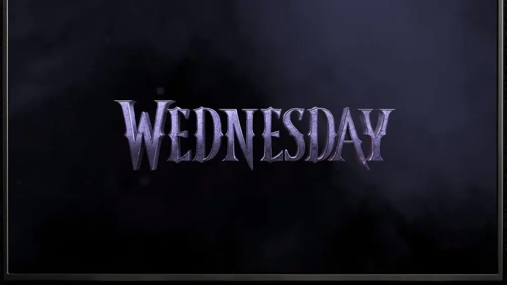 TV on black wall. TV screen playing Netflix series 'Wednesday' trailer