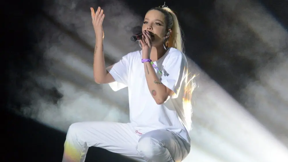 Halsey performs on stage at the 2018 Okeechobee Music and Arts Festival. Okeechobee^ FL - March 2^ 2018