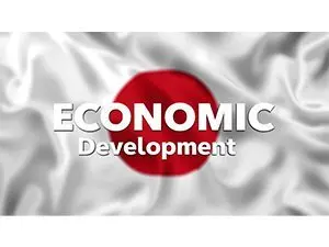 the-words-economic-development-over-a-japanese-flag