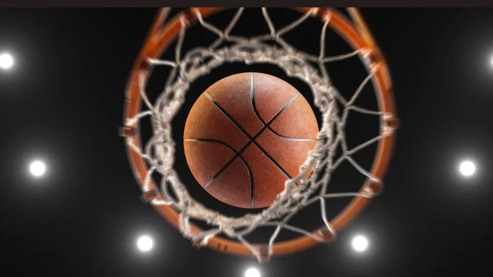 3d rendering basketball on hoop and lighting from roof stadium