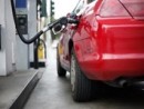 wpid-gas-pump-in-car-jpg