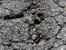 crumbling-asphalt-jpg