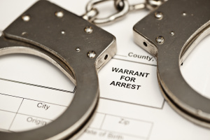 handcuffs-on-a-warrant-for-arrest