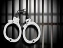 arrest-7-handcuffs-on-left-with-cell-bars-jpg-11