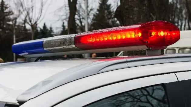 red-and-blue-lights-of-police-car-in-day-time-patrolling-the-city-crime-scene-selective-focus-3
