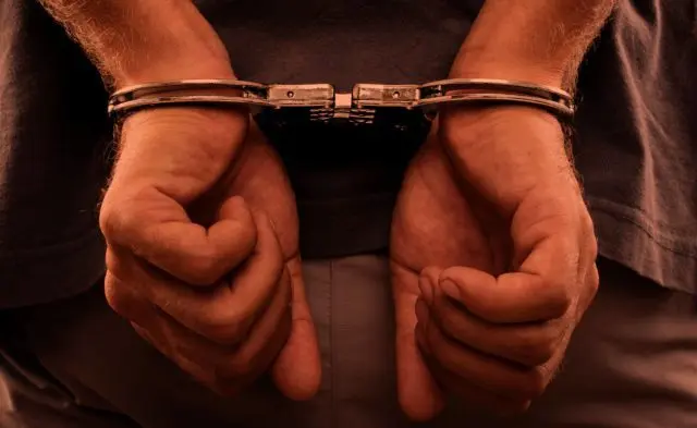 hands-in-handcuffs-e1675731606770-9