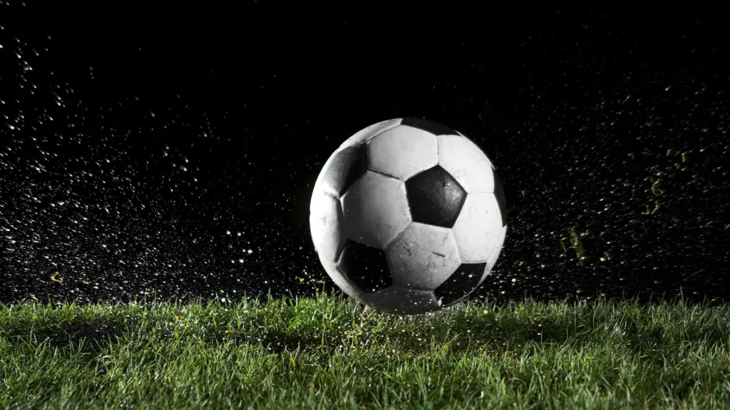 soccer-ball-in-motion-over-grass