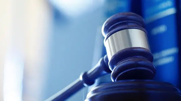 gavel-in-front-of-row-of-law-books