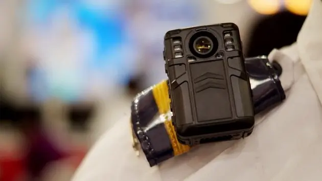 close-up-of-a-body-cam-audio-video-recording-equipment-on-police-officer