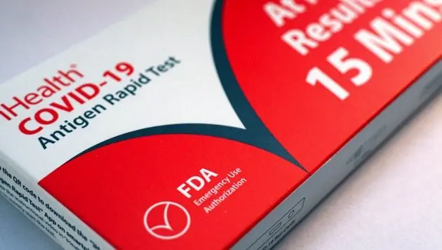 in-this-photo-illustration-a-covid-19-antigen-rapid-test