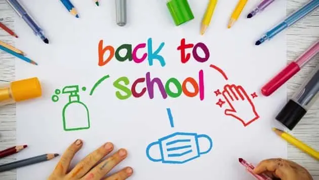 little-girl-is-drawing-about-back-to-school-and-coronavirus-protection-icons