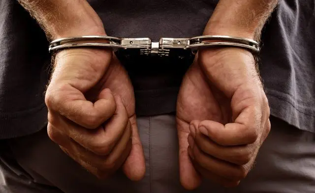 hands-in-handcuffs-e1567192719680-6