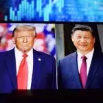 U.S. President Donald Trump and Chinese President Xi Jinping appear on a smartphone screen