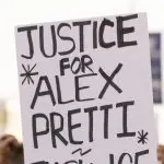 People protest the ICE killing of Alex Pretti in front of the downtown Federal Building. Los Angeles^ California^ USA - January 25^ 2026