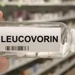 Bottle of LEUCOVORIN tablets on a hospital pharmacy table used to reduce methotrexate toxicity a folinic acid supplement.
