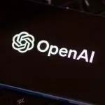 OpenAI logo seen on the screen of smartphone. AI software developer. London^ United Kingdom^ December 21^ 2022.