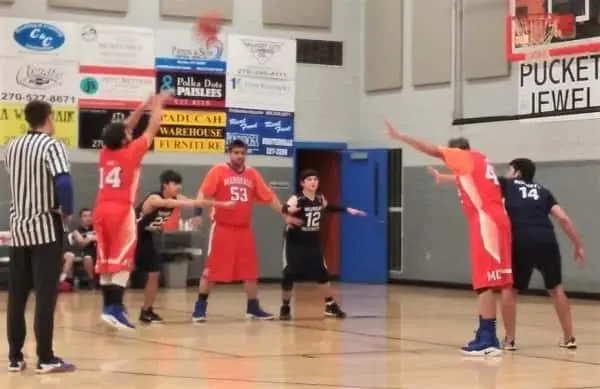 jacob-dunn-at-the-free-throw-line-with-jimmy-lee-jackson-and-dave-chumbler