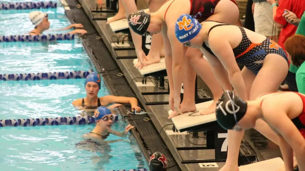 swim-12-10-on-blocks-is-mary-grace-thompson-lane-5-is-sofia-bayer-lane-6-is-delaney-miller-e1578333344313