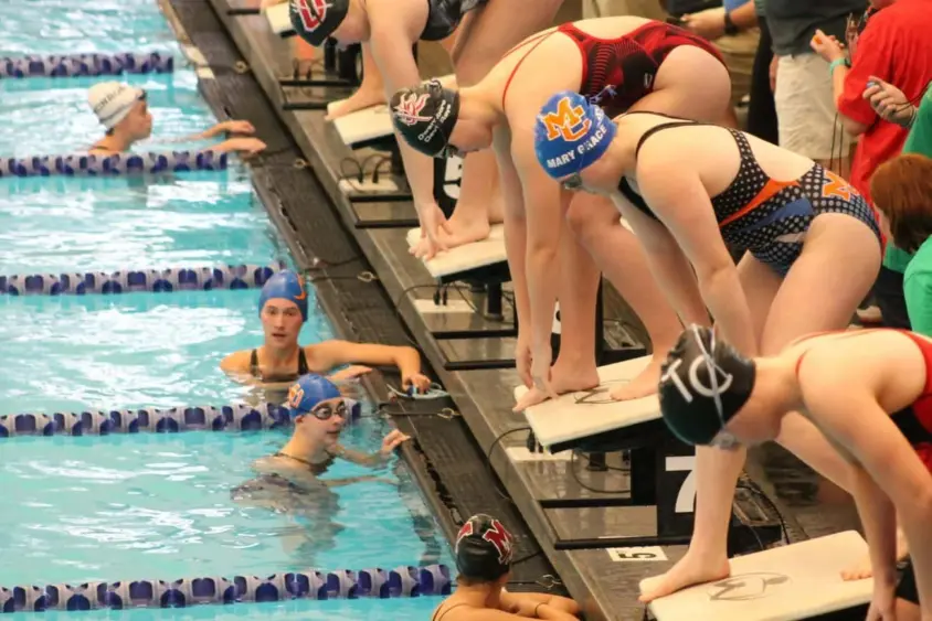 swim-12-10-on-blocks-is-mary-grace-thompson-lane-5-is-sofia-bayer-lane-6-is-delaney-miller-e1578333344313
