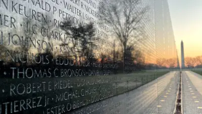 View of names etched into the granite face of the Vietnam Veterans Memorial