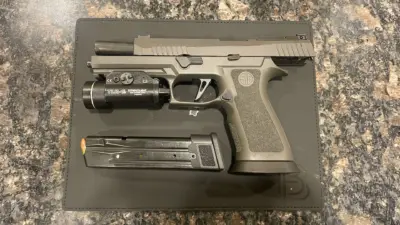 A photograph of a SIG Sauer P320 XFive Legion