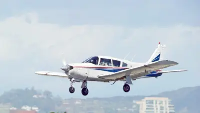 Piper PA-28R-200 fixed wing single engine aircraft approaching runway for a landing at Santa Monica Airport in Los Angeles^ California USA SANTA MONICA/CALIFORNIA - MARCH 6^ 2016
