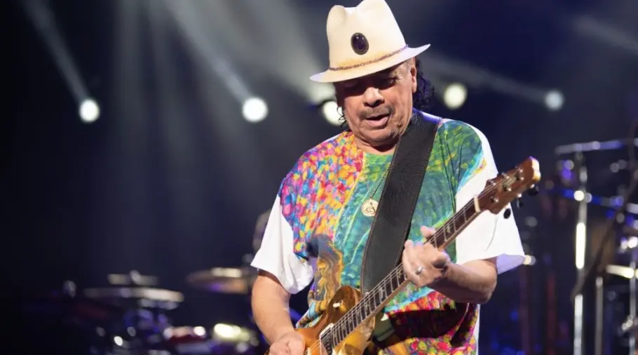 Carlos Santana performs on stage at the iThink Financial Amphitheatre. WEST PALM BEACH^ FLORIDA - AUGUST 22^ 2022