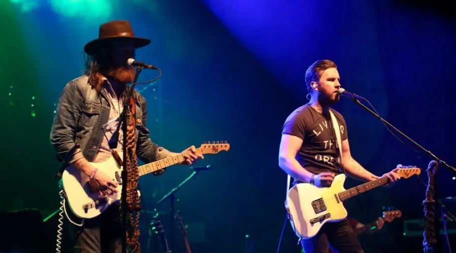 NEW YORK-MAY 6: Singers T.J. Osborne (R) and John Osborne of Brothers Osborne perform onstage at the Paramount on May 6^ 2016 in Huntington^ New York.