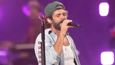Thomas Rhett performs in West Palm Beach^ Florida on September 4^ 2025. The performance was part of his Better In Boots tour.