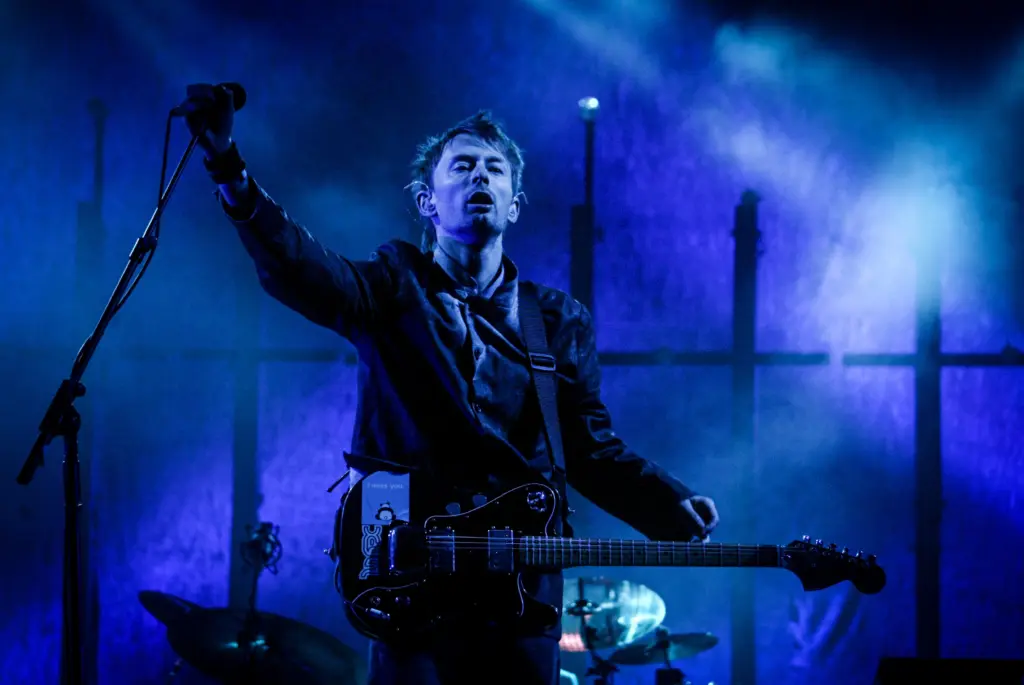 Thom Yorke of Radiohead performs on the Pyramid stage during the 2003 Glastonbury Festival being held at Worthy Farm, in Pilton, Somerset on June 28, 2003, near Glastonbury, England. The festival founded in 1970 has grown into one of the largest outdoor green field festivals in the world.