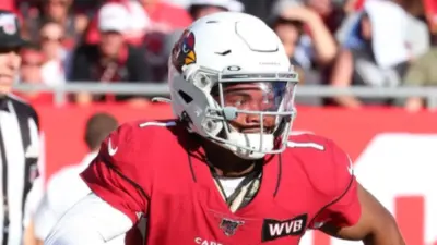 Arizona Cardinals quarterback and first overall draft pick Kyler Murray (1) rolls out of the pocket during an NFL game. Nov 10^ 2019; Tampa^ FL USA