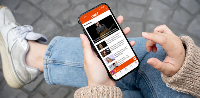 female-holding-onecms-app