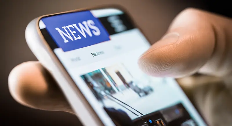 reading news on mobile device