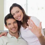 Portrait,Of,A,Happy,Young,Woman,Showing,Engagement,Ring,Besides