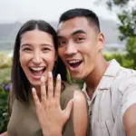 Engagement,,Ring,And,Celebration,With,A,Young,Couple,Announcing,Their